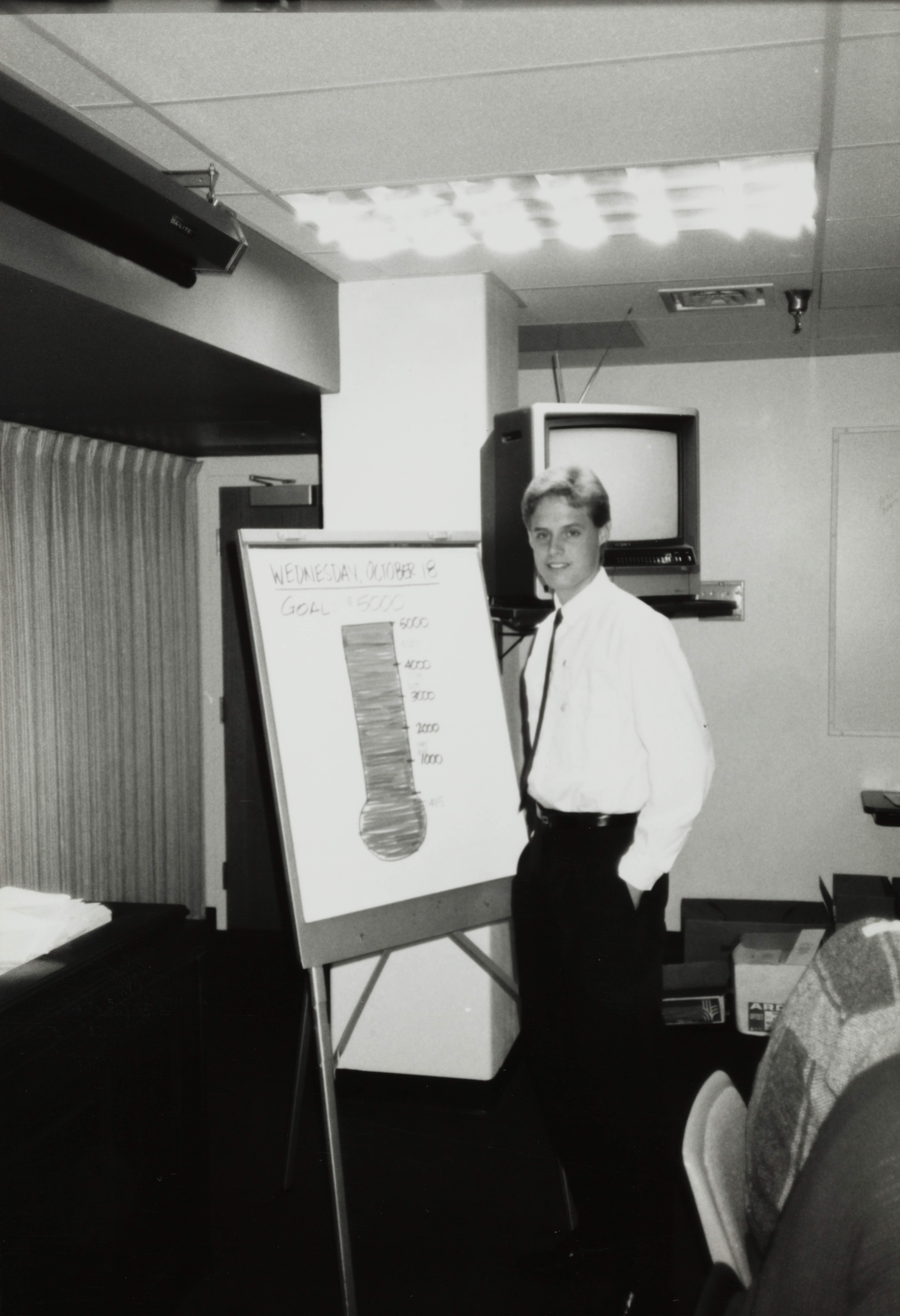 Theta Omicron Chapter Member with Progress Poster, October 18, 1989