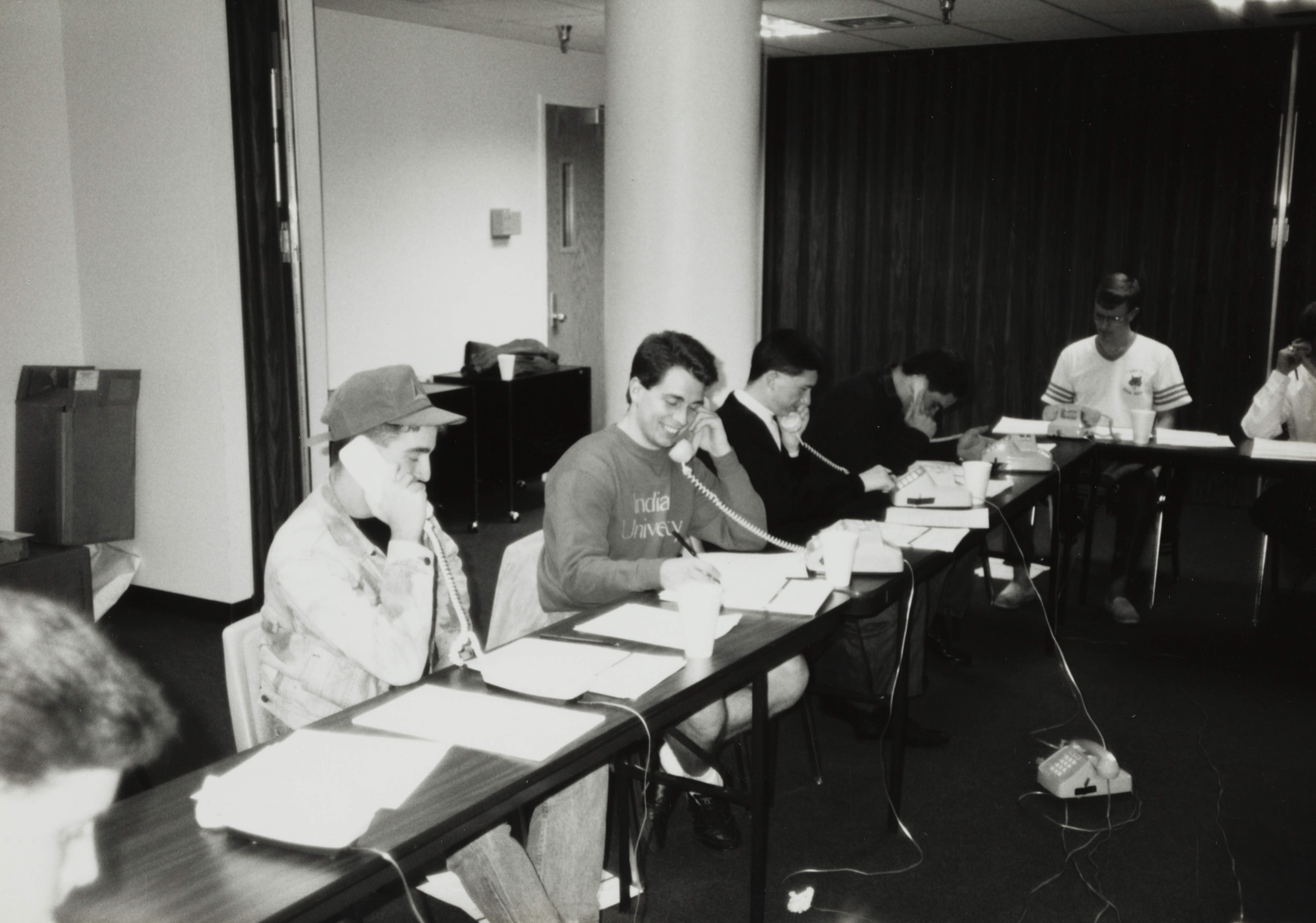 Theta Omicron Chapter Members on Phones at Phone-A-Thon Photograph 4, October 23, 1989