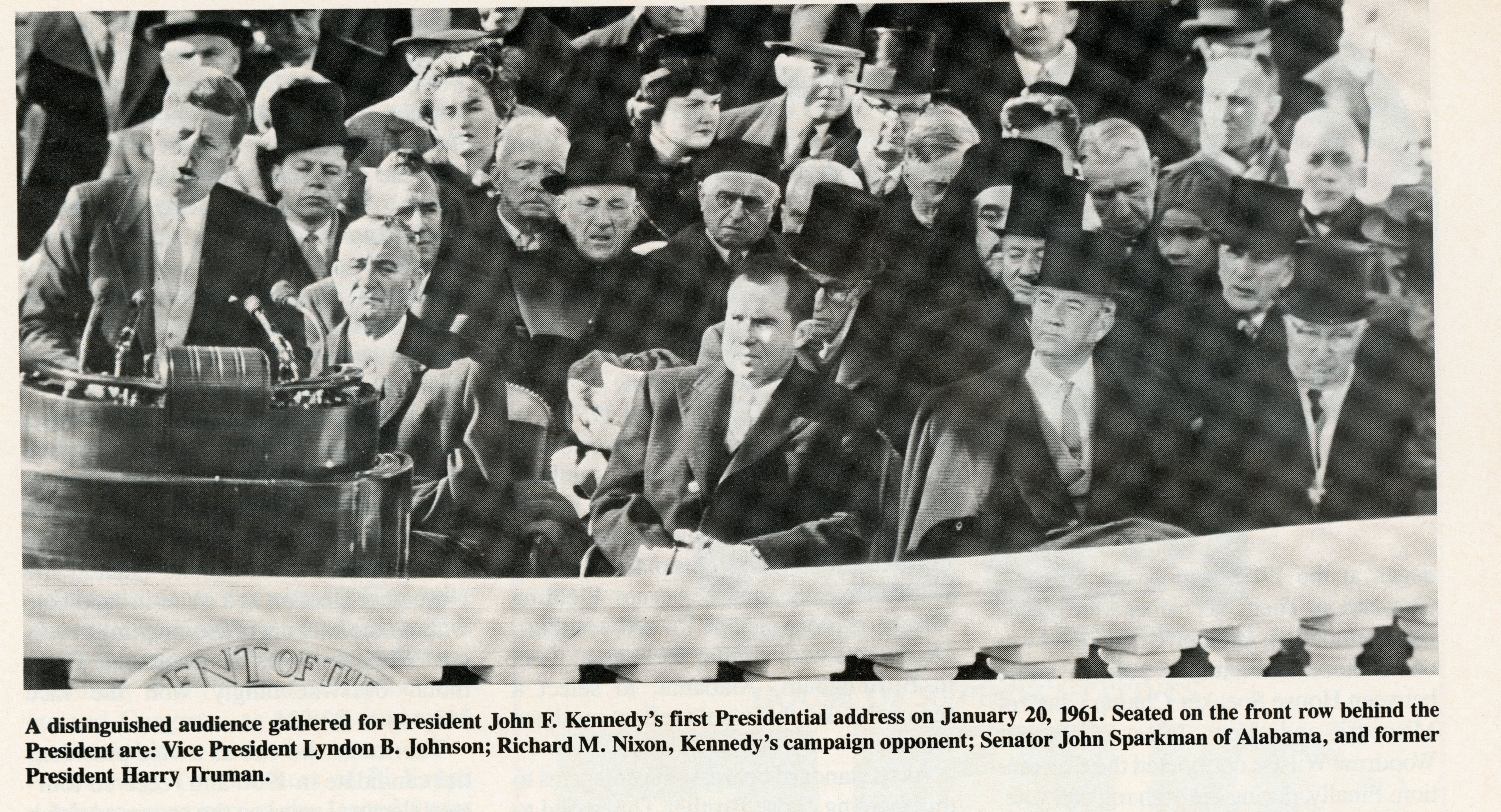A distinguished audience gathered for President John F. Kennedy's first Presidential address on January 20, 1961.&nbsp; Seated on the front row behind the President are:&nbsp; Vice President Lyndon B. Johnson; Richard M. Nixon, Kennedy's campaign opponent; Senator John Sparkman of Alabama and former President Harry Truman.