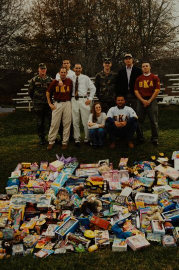 Unidentified Pose With Toys on Lawn Photograph, c. 1990s