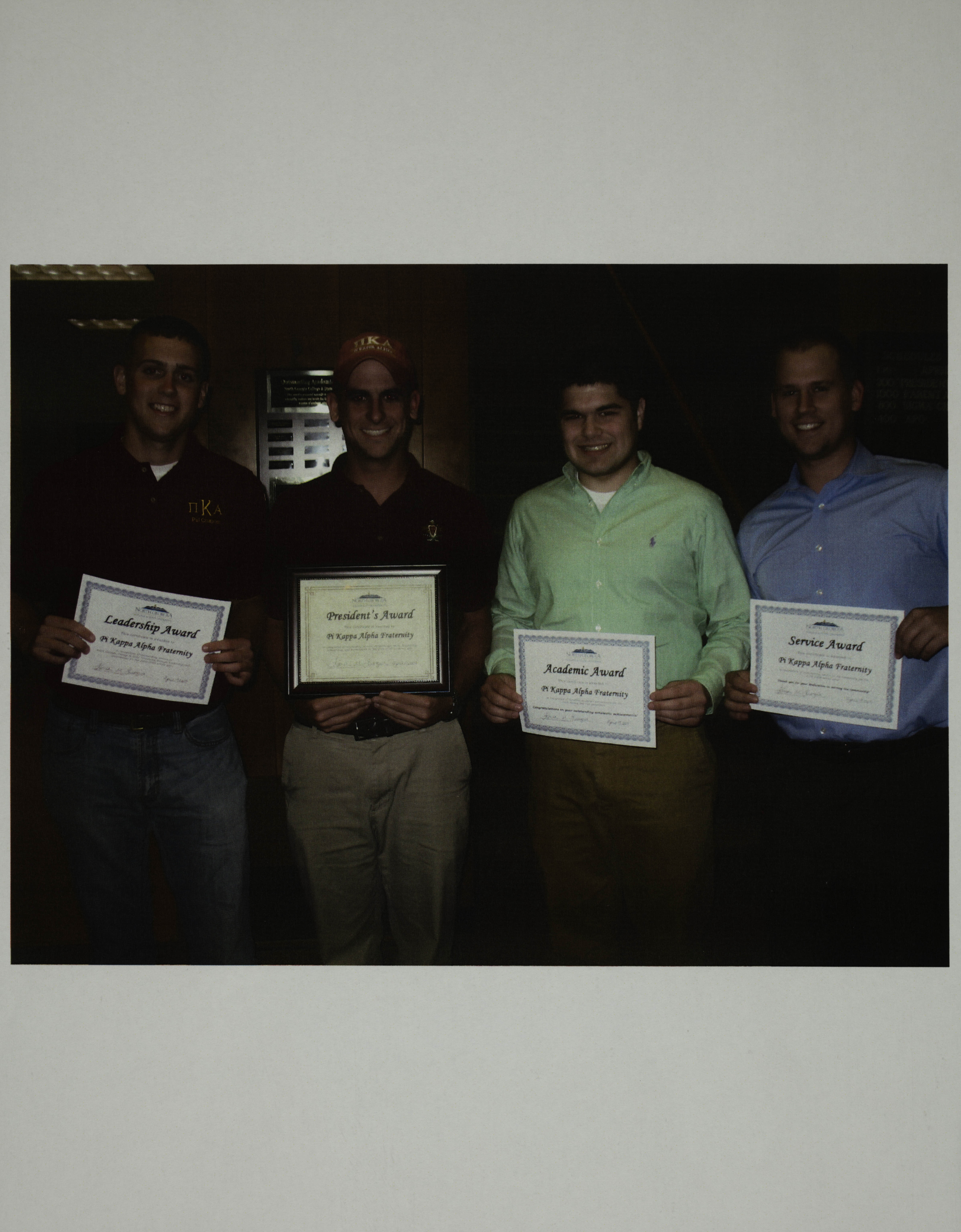 Four Unidentified Pikes With Award Certificates Photograph, c. 2000s
