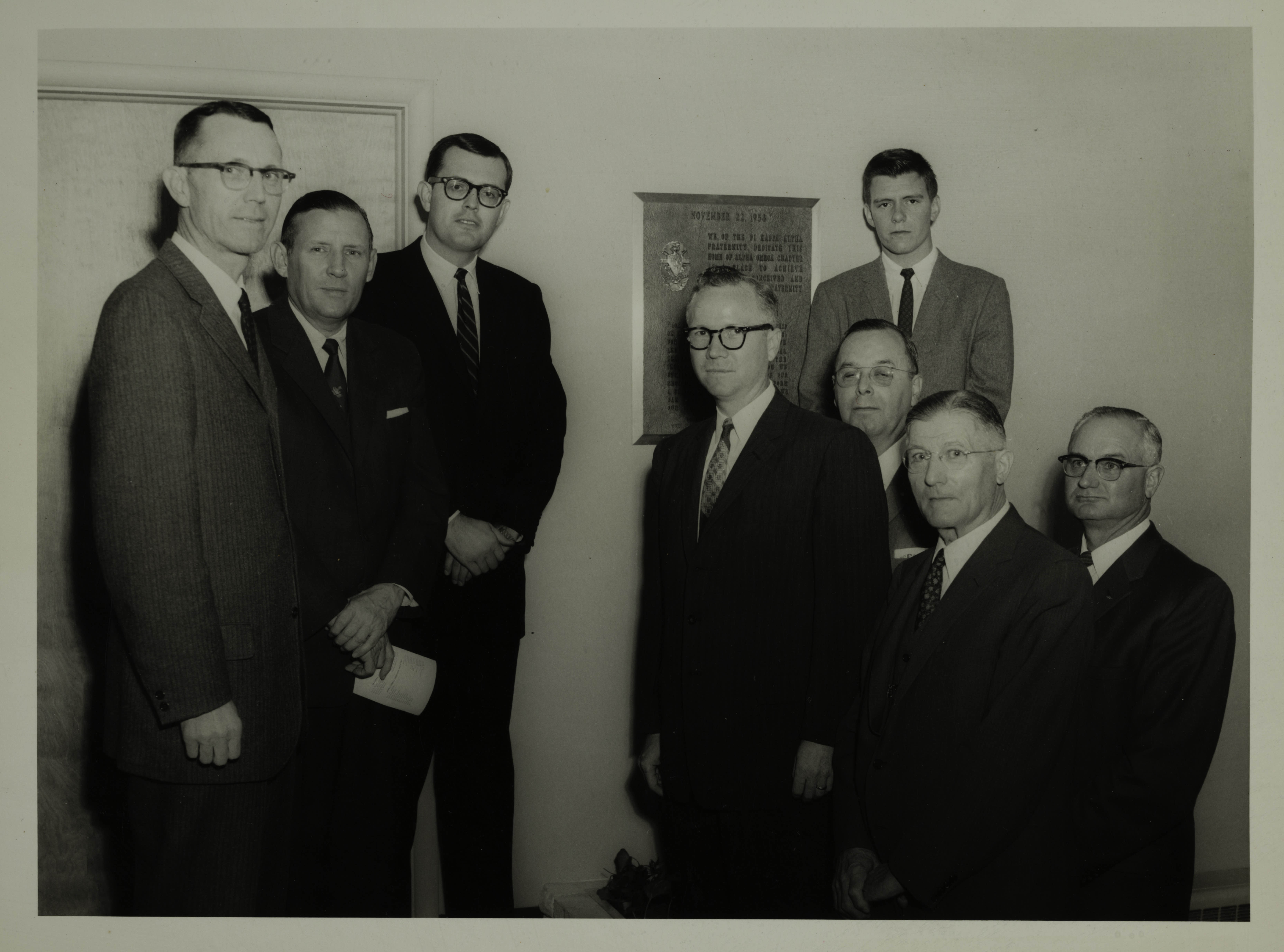 Eight Unidentified Pikes in Front of Plaque Photograph, c. 1958