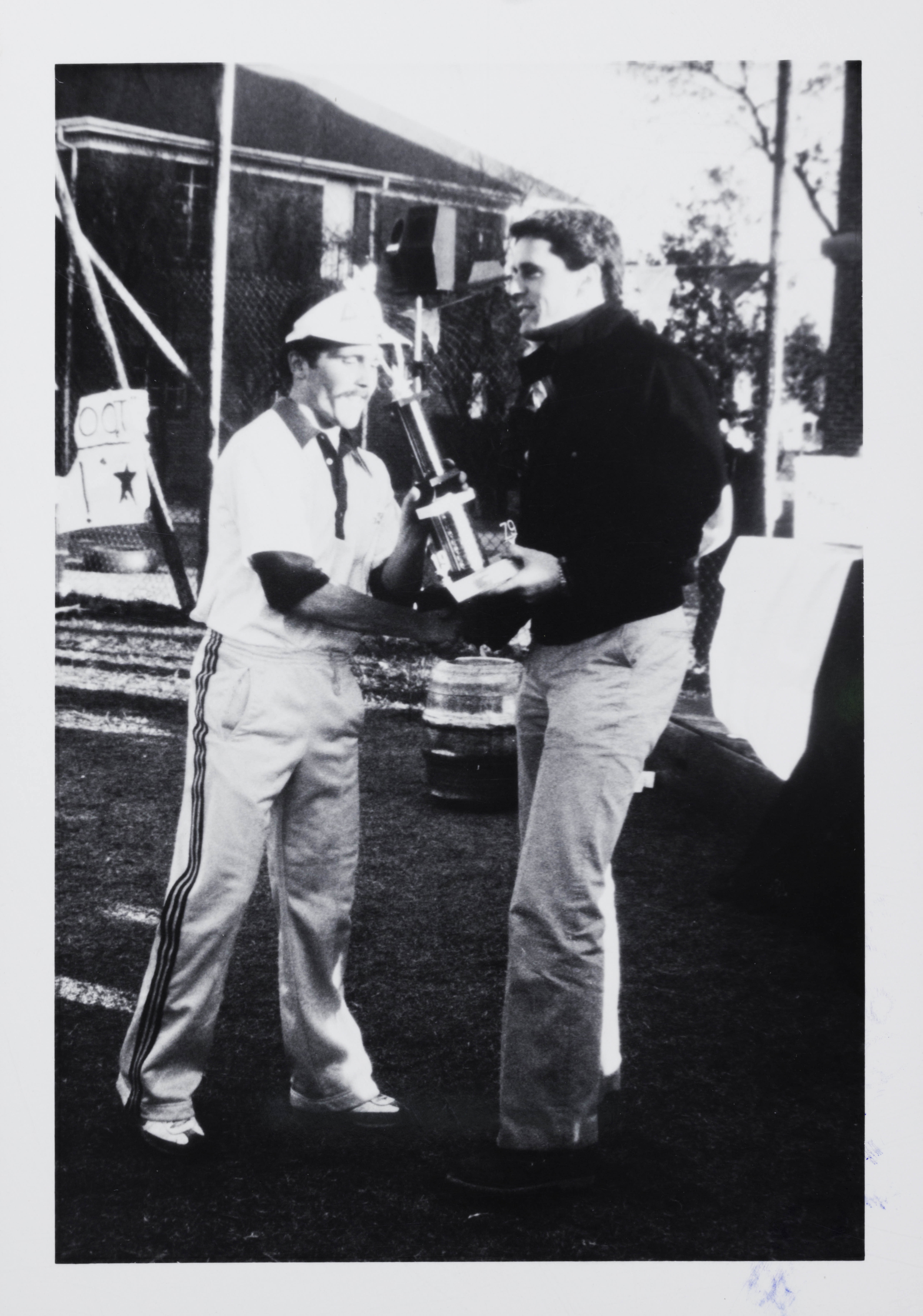 Matt Burtelow Receives Trophy From Randy Hughes Photograph, 1979