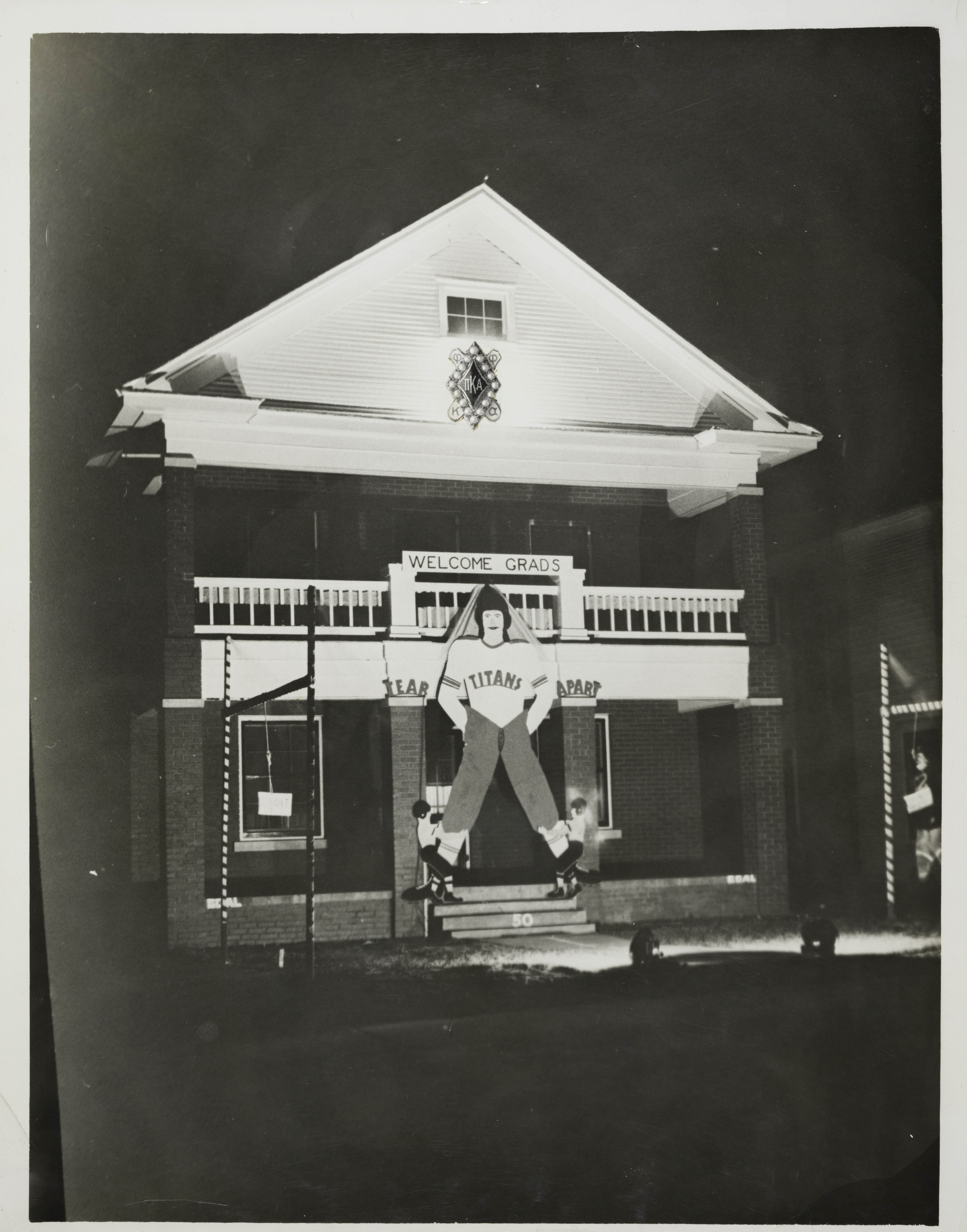 Gamma Upsilon Chapter House With Homecoming Decorations at Night Photograph, October 30, 1939