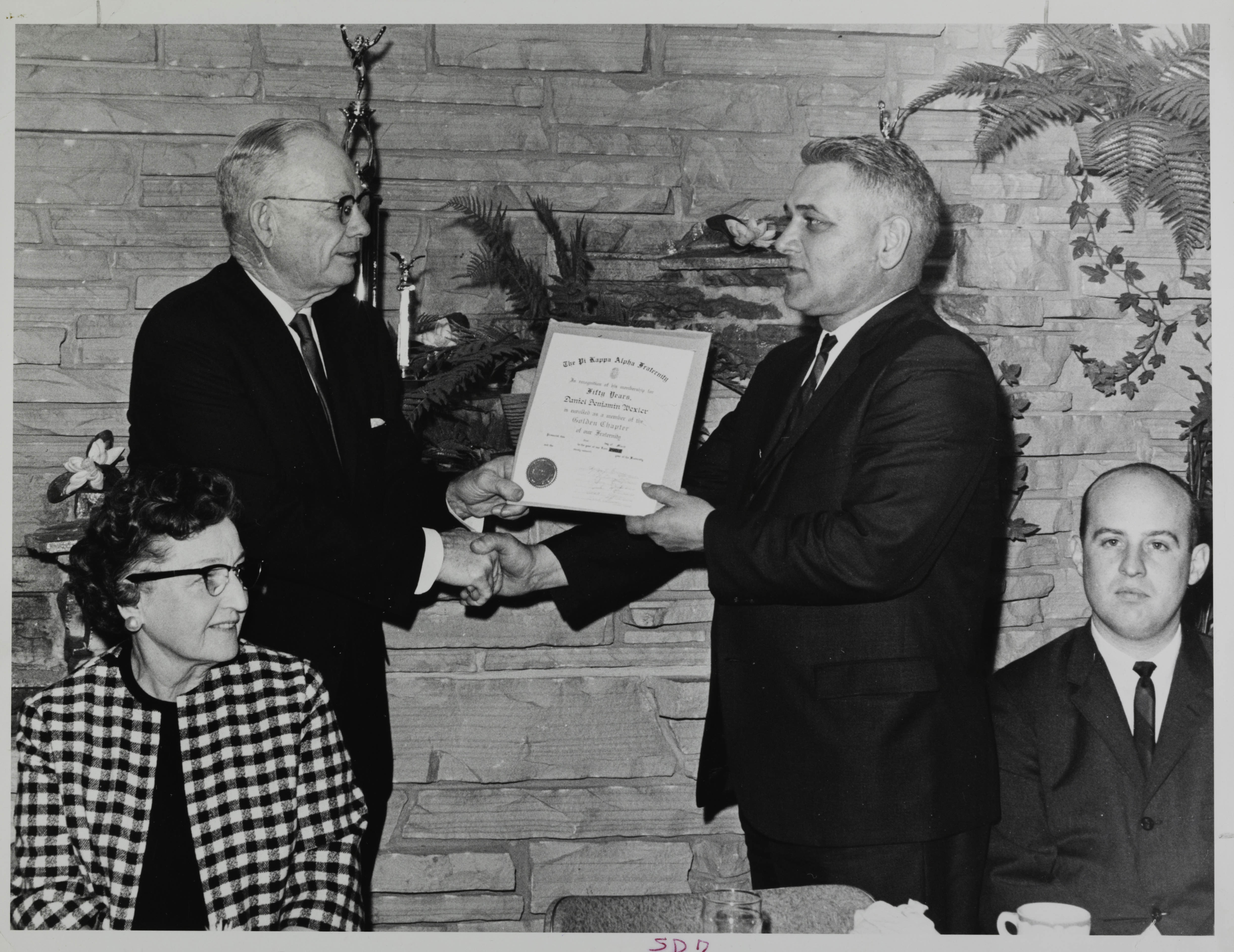 Daniel Wexler Receiving Fifty Year Certificate Photograph, March 1, 1965