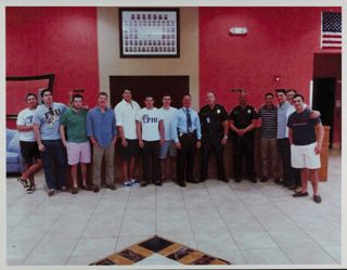 Kappa Gamma Chapter Members and Police Officers at Brunch Photograph, 2013