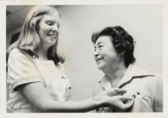 Theodora Newman Receives Golden Shield Photograph, 1977 (image)