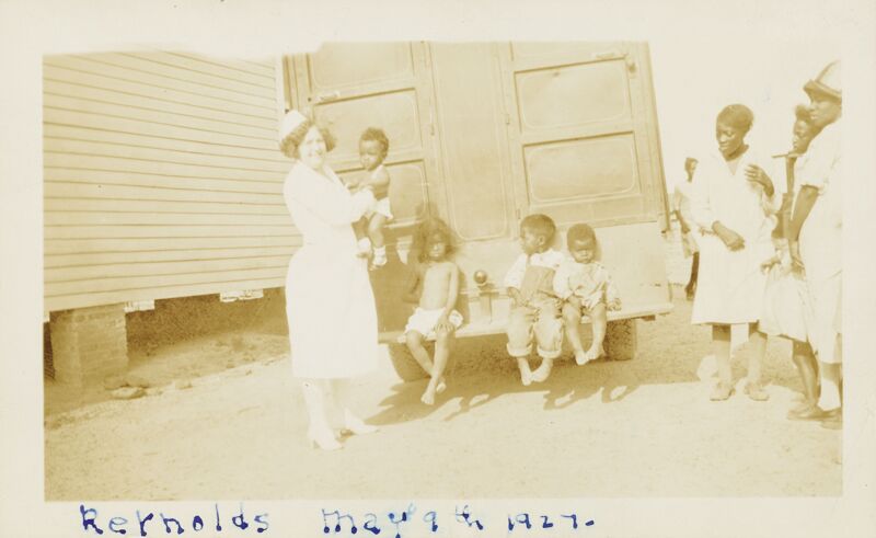 May 9 Healthmobile Nurse with African American Children Photograph Image