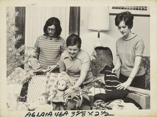 Delta Phi Chapter Members Assembling Christmas Gifts Photograph, 1970 (image)