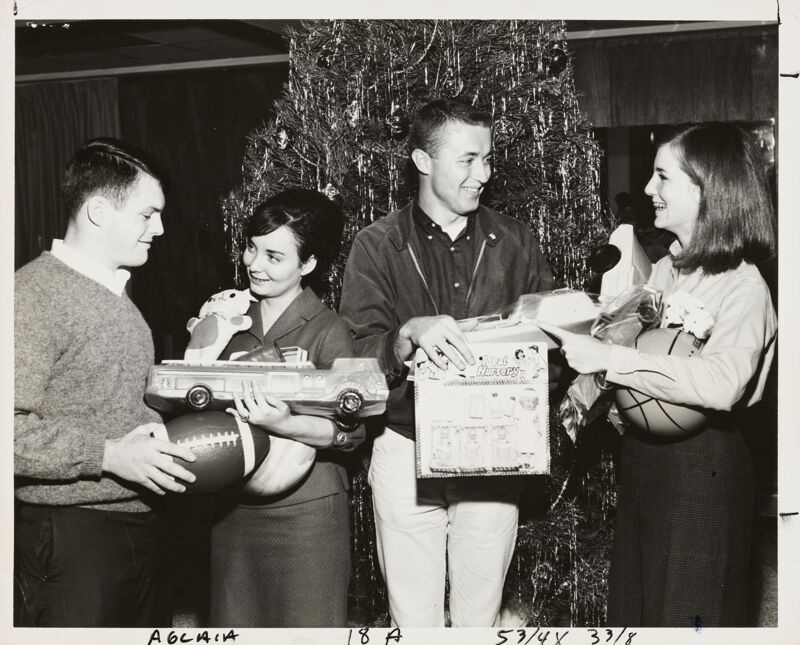 Alpha Psi Members Give Toys to Veterans Photograph, 1965-1966 (Image)