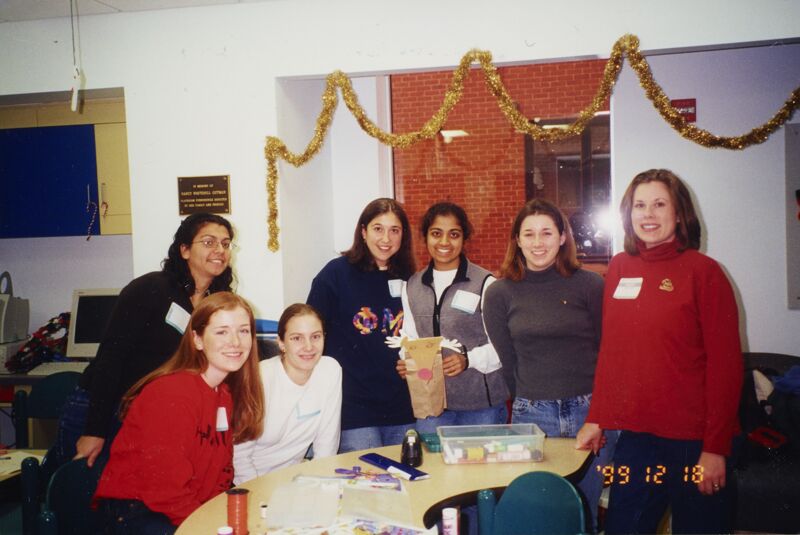 Gamma Tau Members Making Crafts Photograph, December 18, 1999 (Image)