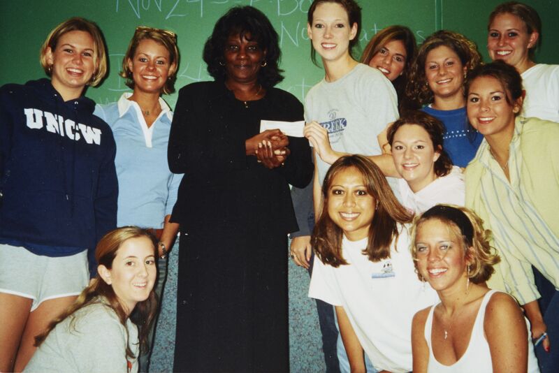 Gamma Kappa Yankee Candle Fundraiser Check Presentation Photograph, October 2002 (Image)