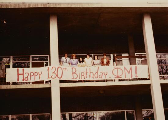 Epsilon Members with Happy 130th Birthday Sign Photograph, 1982 (image)