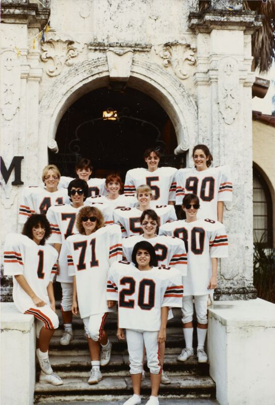 Alpha Omega Members in Football Uniforms Photograph, c. 1986 (Image)