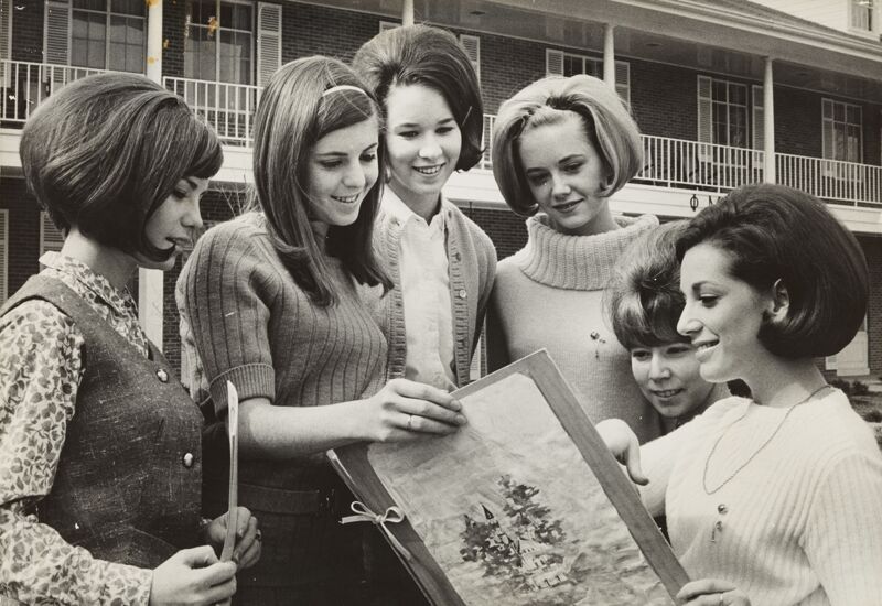 Alpha Delta Members with Scrapbook Photograph, Spring 1968 (Image)
