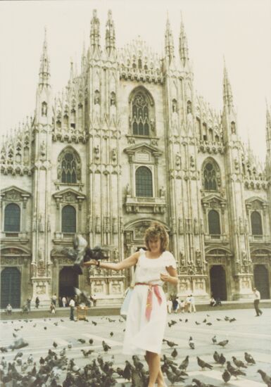Elizabeth McFarland Feeding Pigeons in Milan Photograph, Fall 1986 (image)