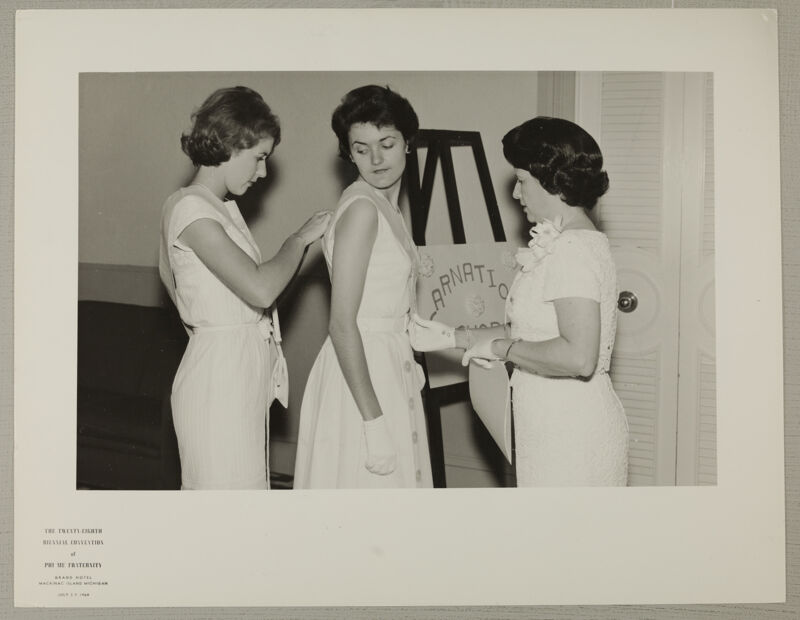 Adele Williamson and Two Unidentified Phi Mus Primp for Convention Photograph, July 3-7, 1964 (Image)