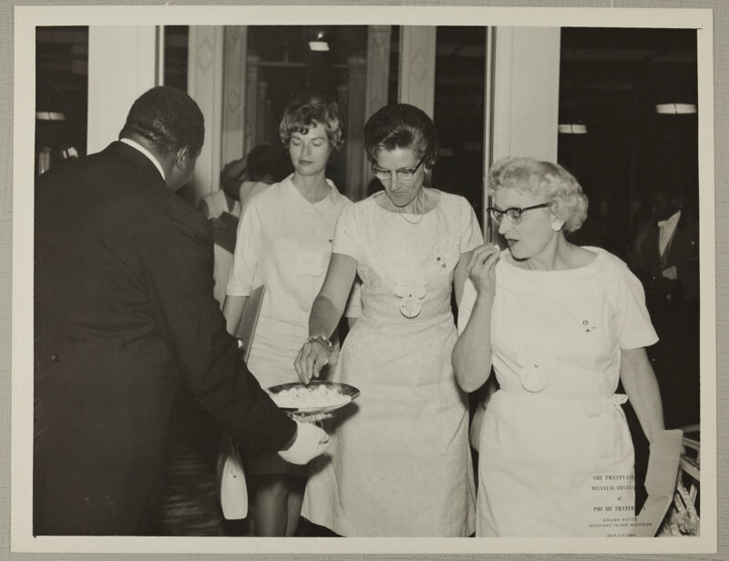 Martha Marsh and Two Unidentified Phi Mus Receive Mints at Convention Photograph, July 3-7, 1964 (Image)