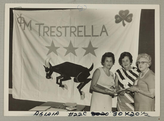 Dunbar Family in Front of Trestrella Banner at Convention Photograph, July 7-12, 1968 (image)