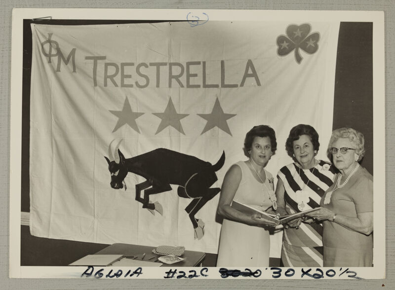Dunbar Family in Front of Trestrella Banner at Convention Photograph, July 7-12, 1968 (Image)