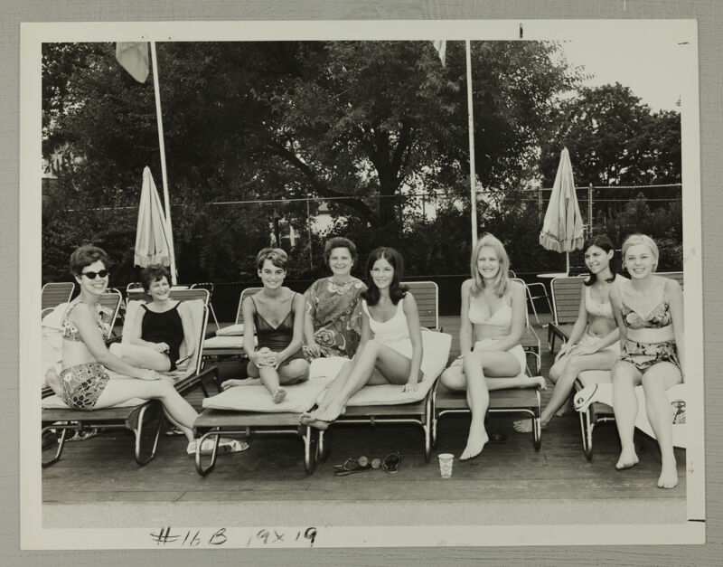 Group of Eight by the Pool Photograph, July 5-10, 1970 (Image)