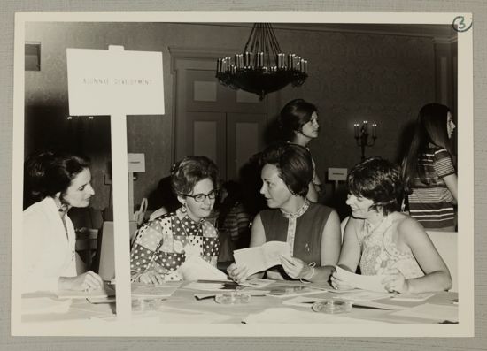 Phi Mus at Alumnae Development Answer Bank Table at Convention Photograph, July 7-12, 1972 (image)