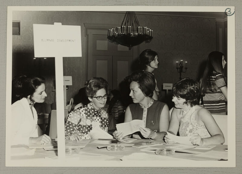 Phi Mus at Alumnae Development Answer Bank Table at Convention Photograph, July 7-12, 1972 (Image)