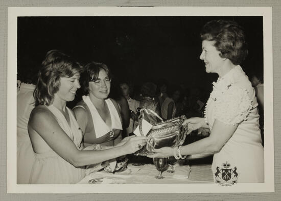 Pugh Receiving Gift from Schillreff and Lucas Photograph, August 2-7, 1974 (image)