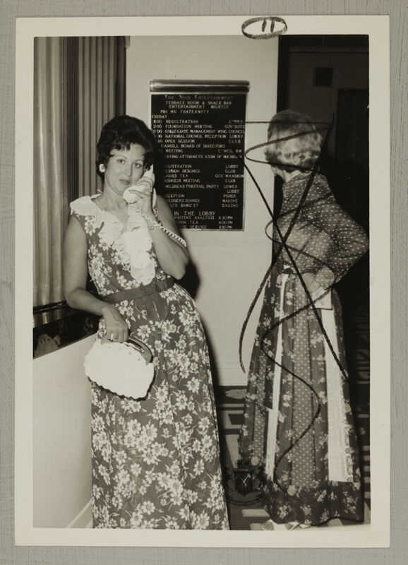 August 2-7 Patricia Cramer and Ann Byrd Using Telephone at Convention Photograph Image