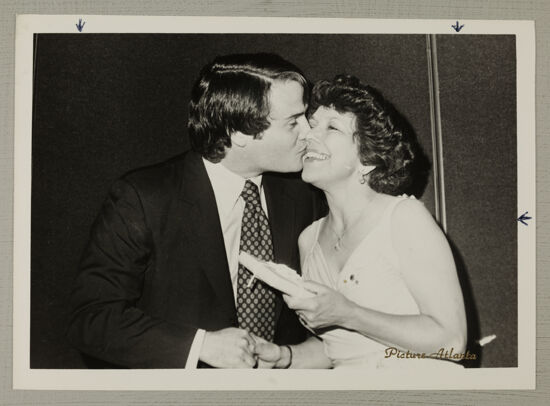 John Walsh Kissing Gloria Henson at Convention Photograph, July 2-6, 1978 (image)