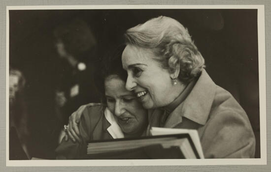 Nancy Cadwallader and Polly Booth Hug at Convention Photograph, June 29-July 3, 1980 (image)