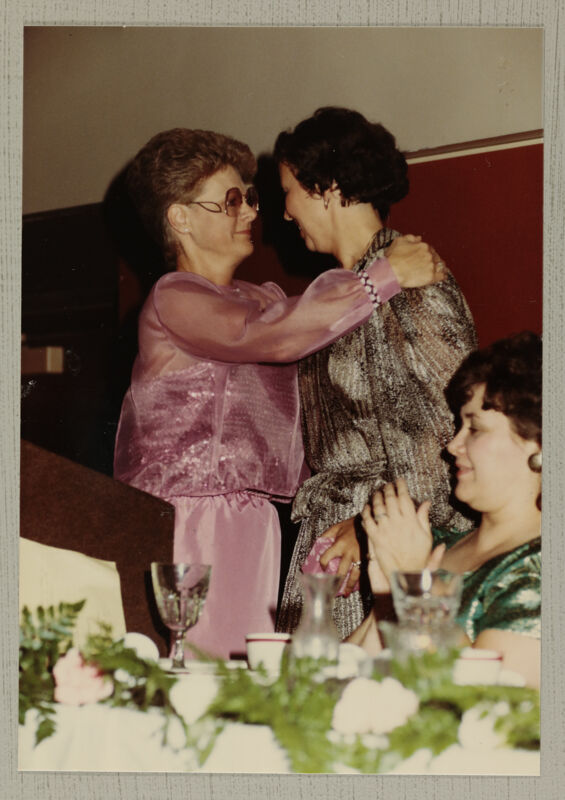 Linda Litter Hugging Pat Cramer at Convention Photograph, July 2-6, 1982 (Image)