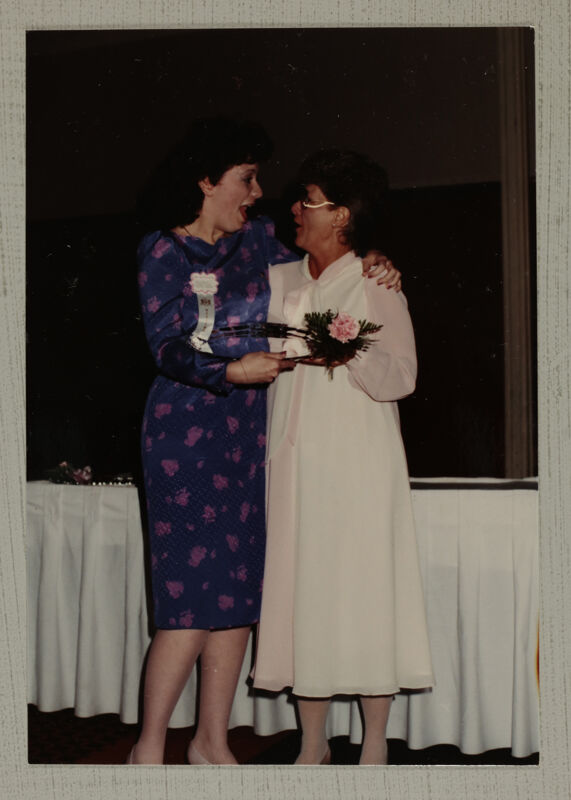 Linda Litter Presenting Outstanding Collegiate Member Award to Anne Burnette Photograph, June 30-July 5, 1984 (Image)