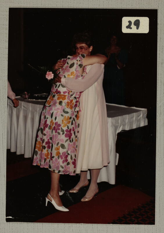 Linda Litter Hugging Adele Williamson at Convention Photograph, June 30-July 5, 1984 (Image)
