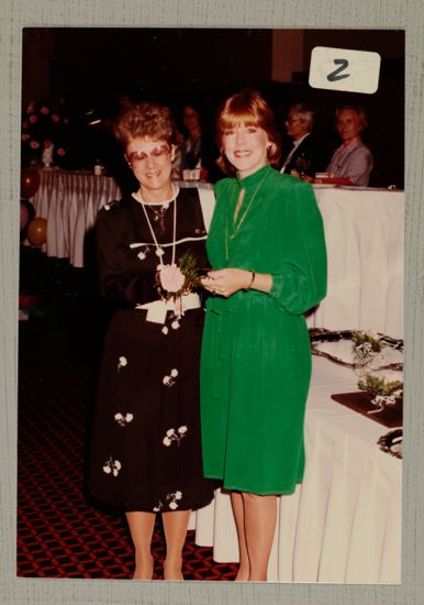 Linda Litter and Dusty Moone With Award at Convention Photograph, June 30-July 5, 1984 (image)