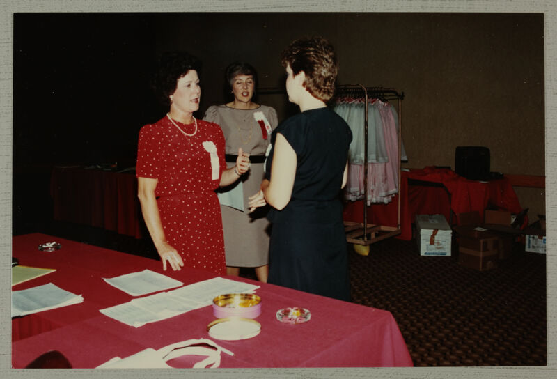 Shellye McCarty, Cookie Keller, and Unidentified Talk in Convention Office Photograph, June 30-July 5, 1984 (Image)