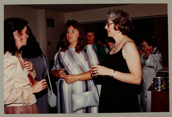 Patty Kennoy, Marilyn Demeter, and Unidentified Talking at Convention Reception Photograph, June 30-July 5, 1984 (image)