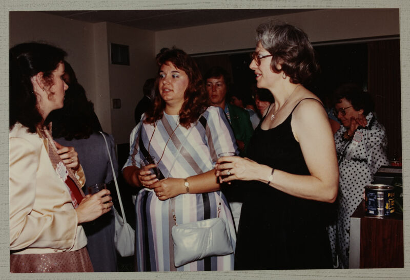 Patty Kennoy, Marilyn Demeter, and Unidentified Talking at Convention Reception Photograph, June 30-July 5, 1984 (Image)