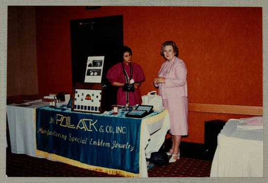 Anne Nelson and Unidentified at Convention Jewelry Exhibit Photograph, June 30-July 5, 1984 (image)