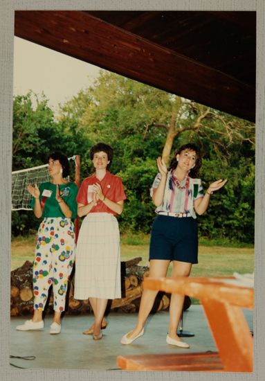 Ryan, Schmidt, and Unidentified Singing at Convention Picnic Photograph, June 30-July 5, 1984 (image)