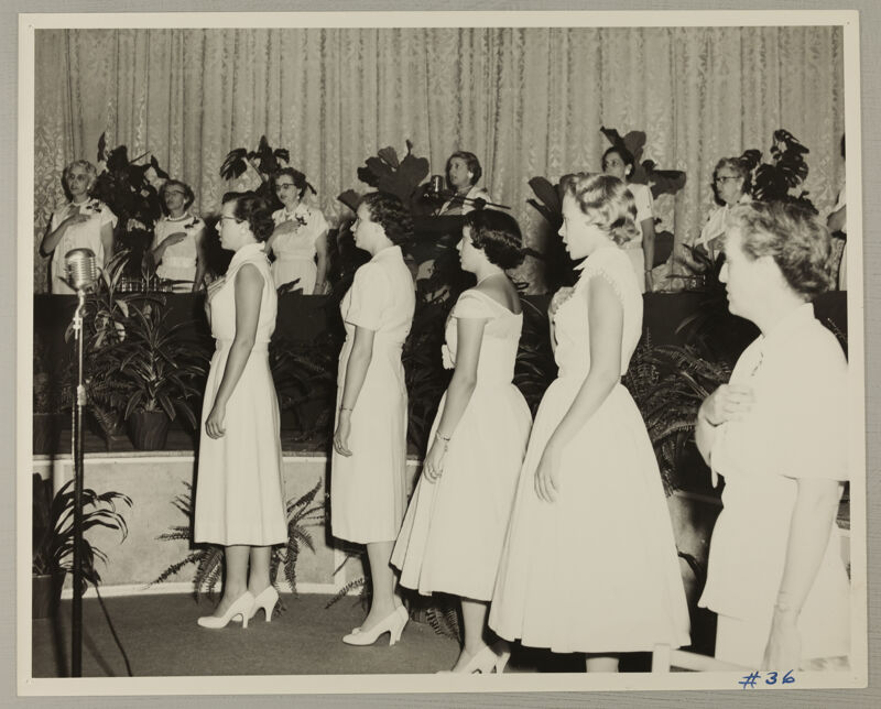 Phi Mus With Hands Over Their Hearts at Convention Photograph, July 11-16, 1954 (Image)