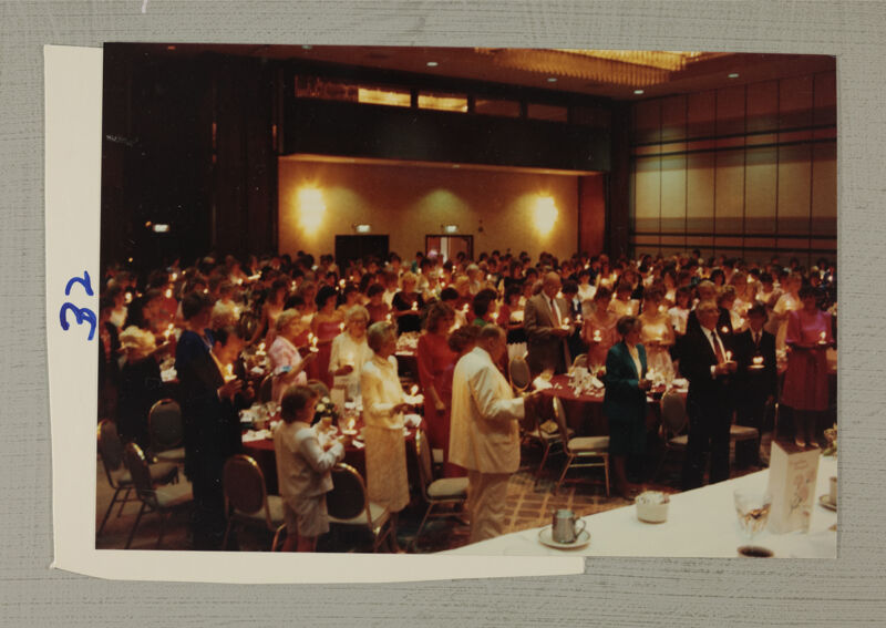 Phi Mus and Guests Hold Candles at Convention Banquet Photograph 2, July 6-10, 1986 (Image)
