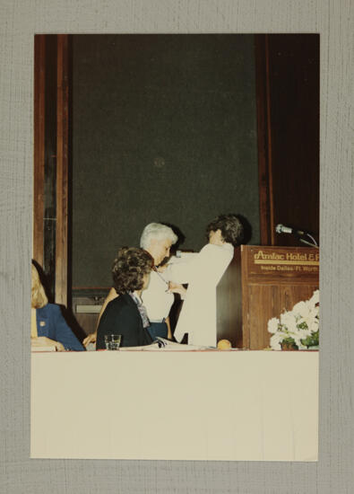 Ruth Proctor Receiving Council Badge at Convention Photograph, July 6-10, 1986 (image)