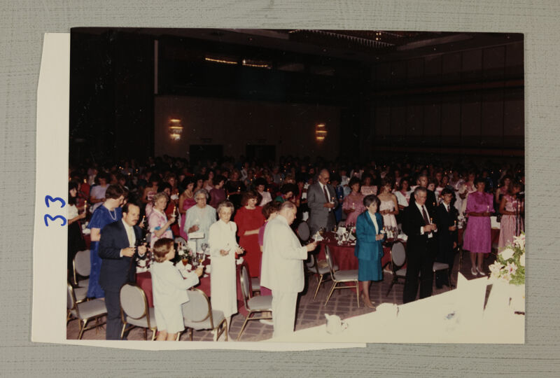 Phi Mus and Guests Hold Candles at Convention Banquet Photograph 1, July 6-10, 1986 (Image)