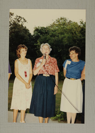 Angelini, Freear, and Nisbet at Convention Picnic Photograph, July 6-10, 1986 (image)