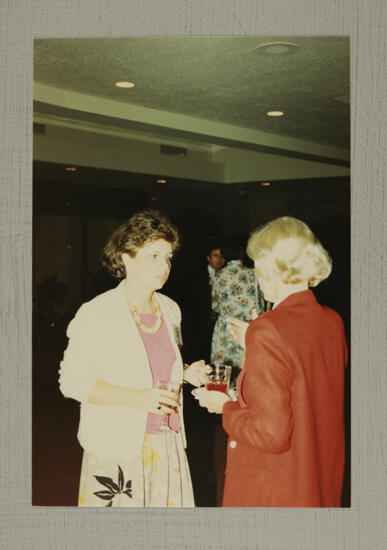 Susie Caldwell and Unidentified Talking at Convention Photograph, July 6-10, 1986 (image)