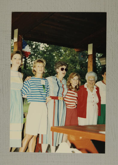 Evans, Logan, Litter, Hughes, and Unidentified at Convention Picnic Photograph, July 6-10, 1986 (image)