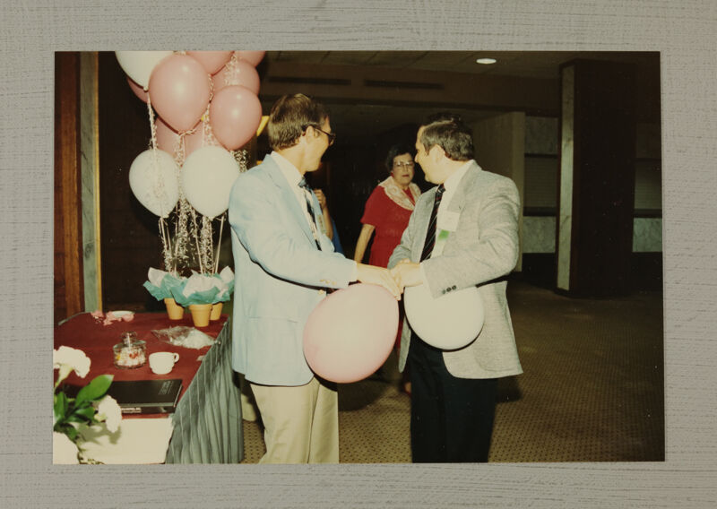 Joe Ott and Dan Hurgoi with Balloons at Convention Photograph, July 6-10, 1986 (Image)