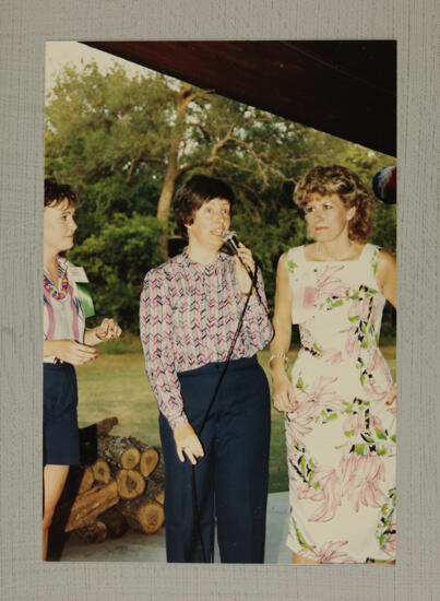 Monsanto, King, and Unidentified at Convention Picnic Photograph, July 6-10, 1986 (image)