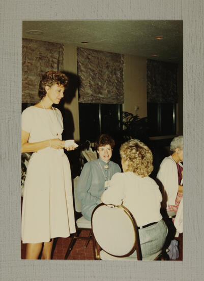 Wadsworth, Ryan, and Unidentified Talking at Convention Photograph, July 6-10, 1986 (image)